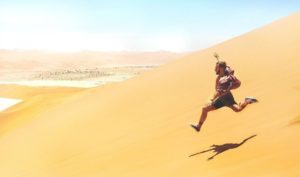 Man running on sand